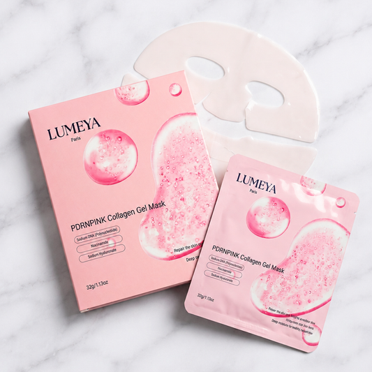 Masque Collagène PDRN Pink Lumeya Paris – boîte, sachet et masque gel sur marbre blanc